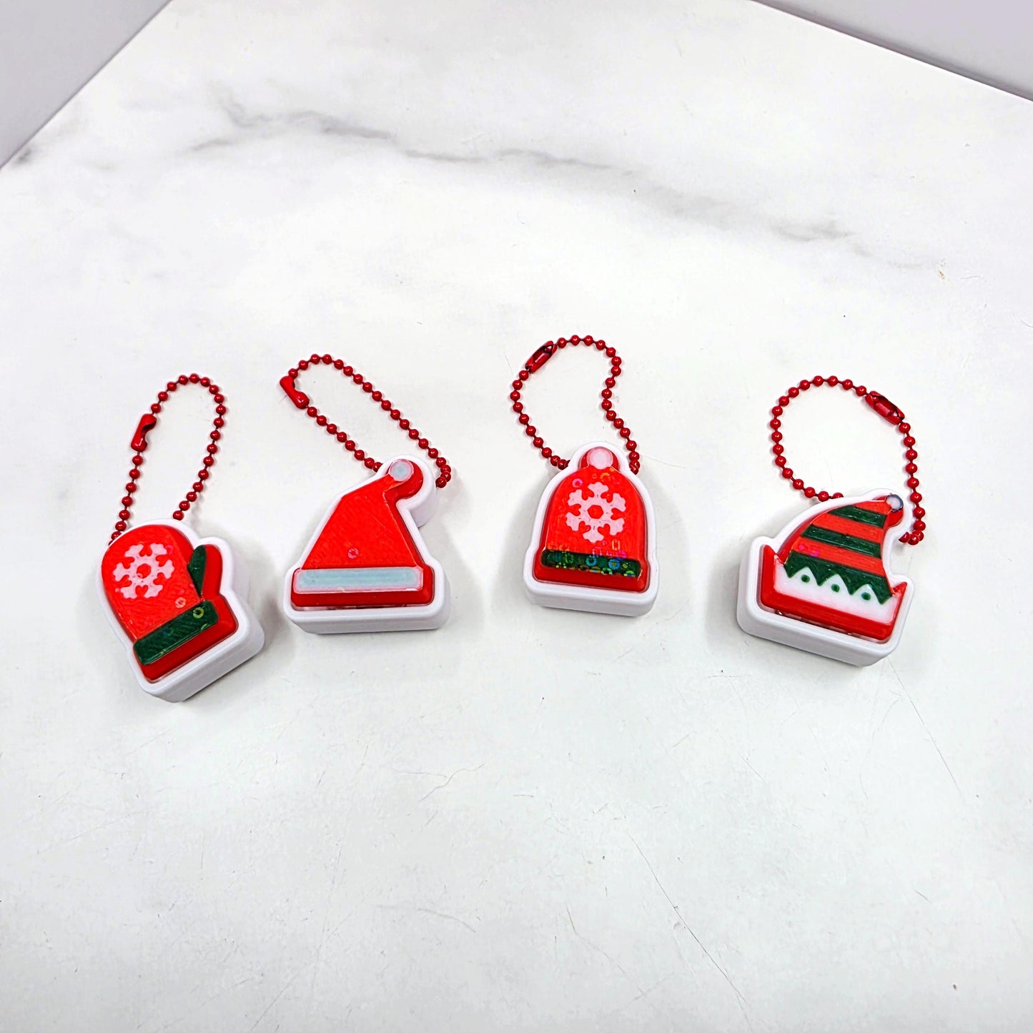 3D Printed Cozy Christmas Fidget Clicker Keychains | Elf Hat, Santa Hat, Beanie & Mitten Holiday Stress Relief Charms